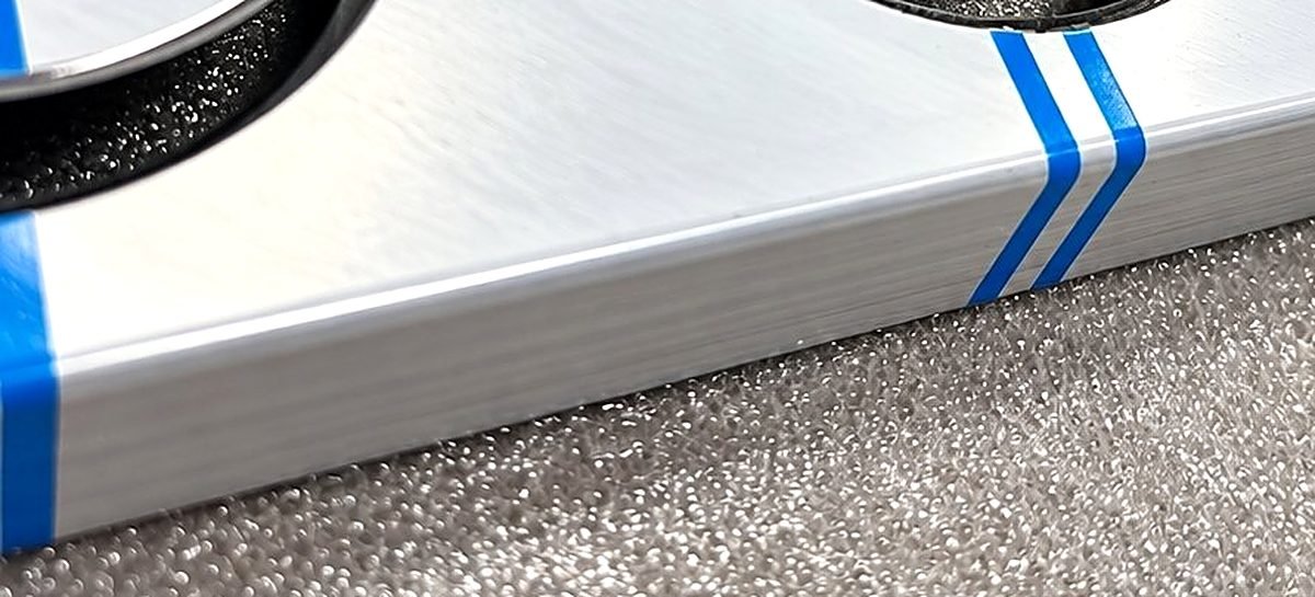 Metal Coin Façade Panels: bent edge close-up 1