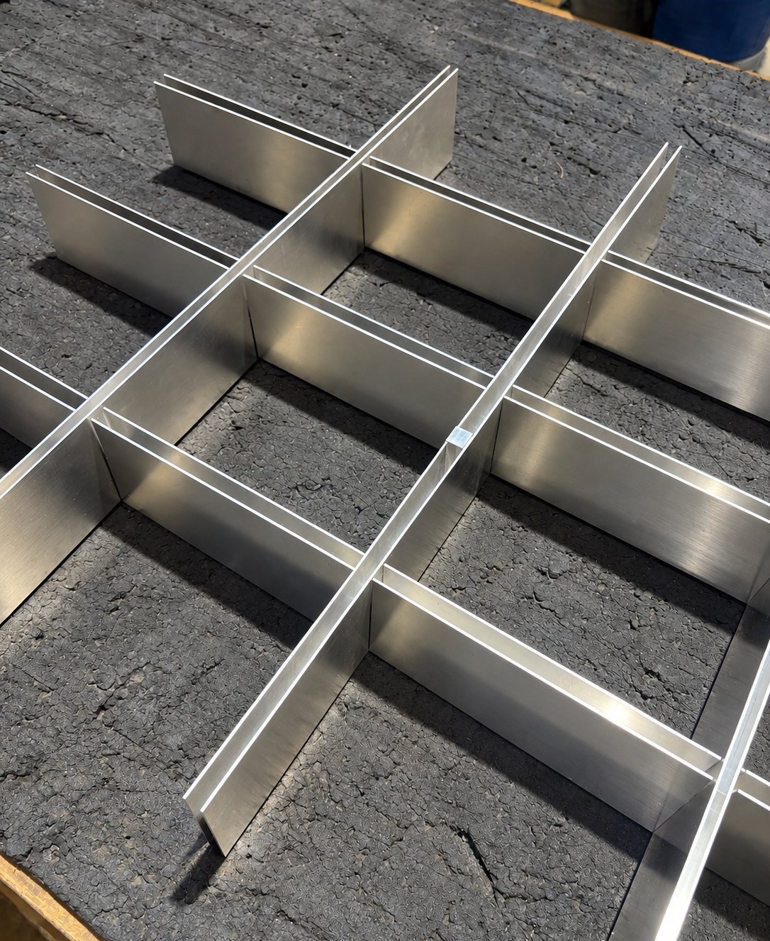 Open-cell stainless steel grid assembled on the workbench