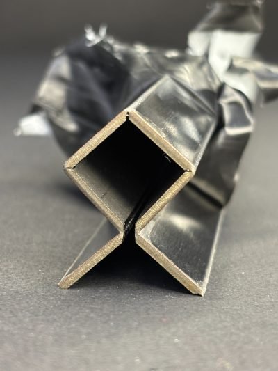 Corner guard profile, end view, protective film still on