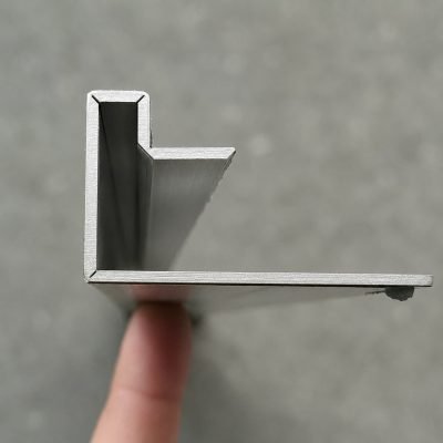Illustration: custom stepped profile held in hand