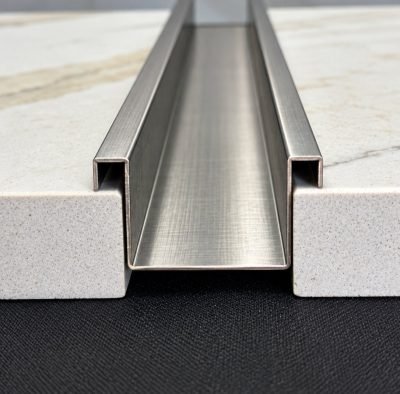 Stainless steel expansion joint profile between stone tiles — Expansion Joint Profile · Architectural Profiles