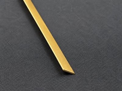 Illustration: flat patti strip in brass, diagonal view