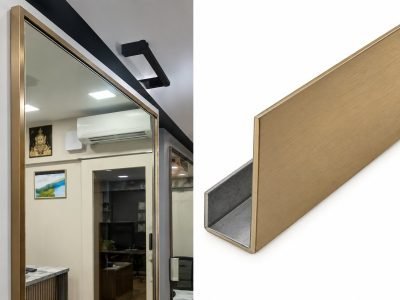Gold J profile framing a mirror, with a close-up of the profile section