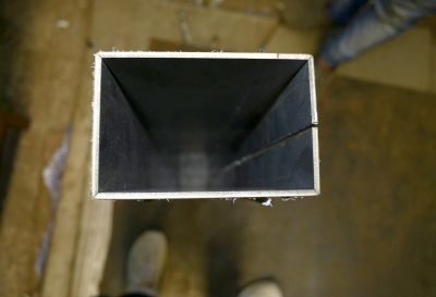 Rectangular metal box section seen from the end