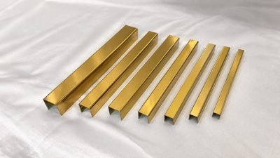 Illustration: U channels in brushed brass, fanned out