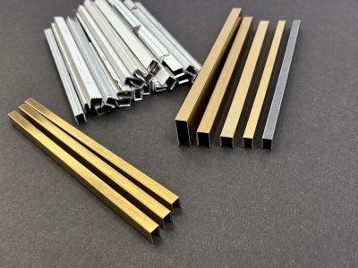 Illustration: U and C channels in stainless and brass finishes