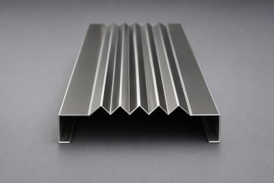 Ribbed highlighter strip in brushed stainless steel