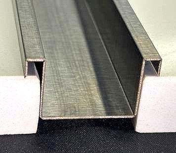 Wall highlighter strip in brushed stainless steel, end view