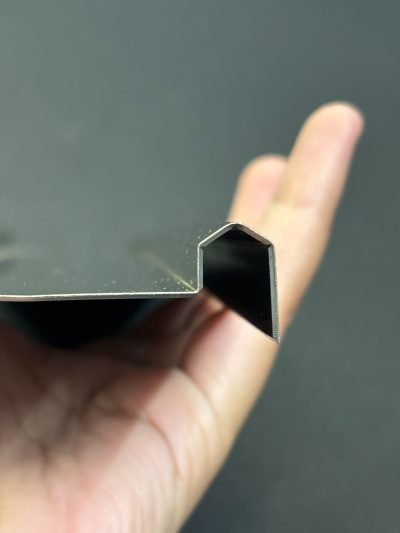 Tile highlighter strip sample held in hand