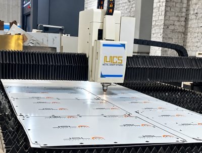 Stainless steel sheet on the fibre laser cutting bed