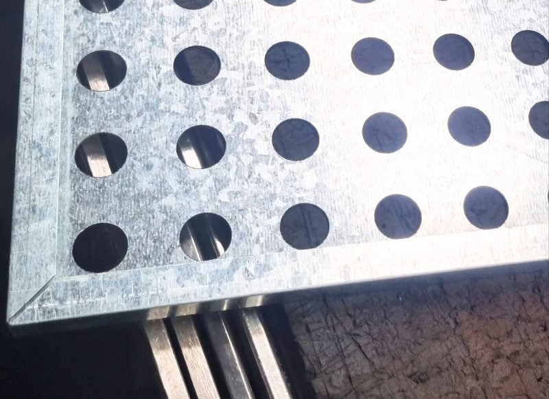 Perforated metal ceiling panel, large round perforation