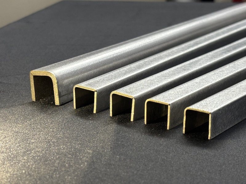 V-grooved stainless steel U sections, end on