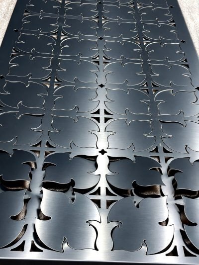 3D folded façade panel with a floral pattern in black, full view
