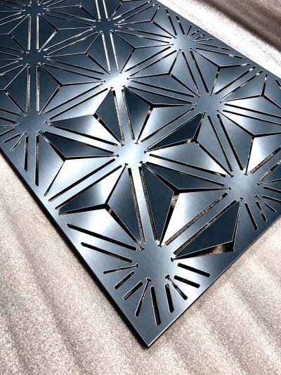 3D folded façade panel with a star pattern, black
