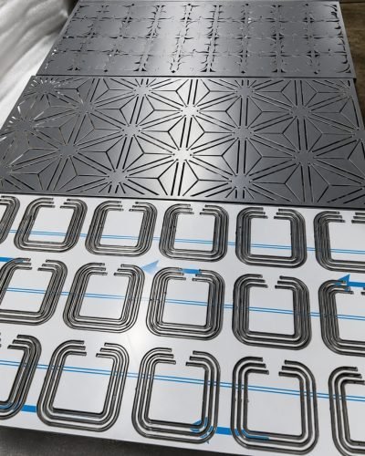 3D folded façade panels in production with protective film