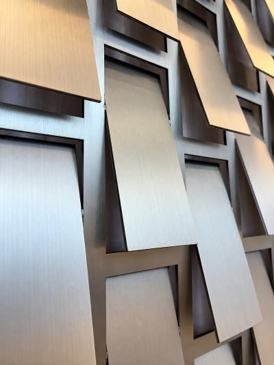 Kinetic façade tiles in brushed stainless steel, detail