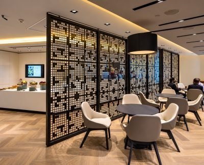 Office partitions with perforated panels in a lounge