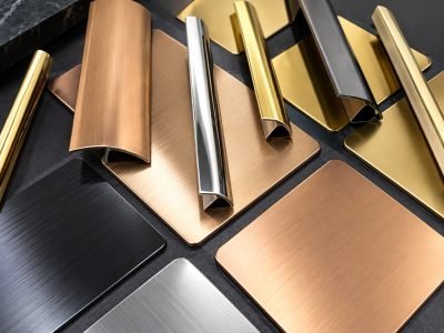 Illustration: decorative flooring inlays in brass, copper and black finishes
