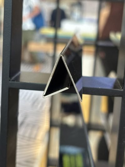 Floor edge profile sample on the showroom display frame