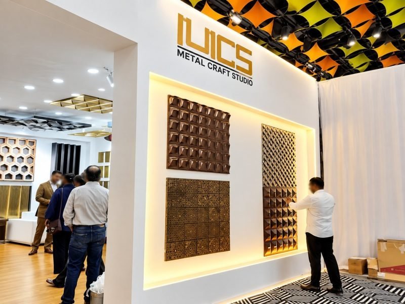 3D metal wall panels in copper and bronze finishes on the stand
