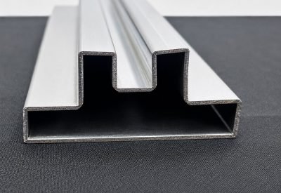 Double-U glass profile in brushed stainless steel