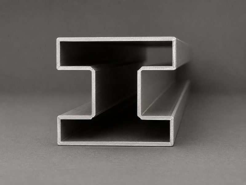 Glass housing profile, H section, in brushed stainless steel, end view