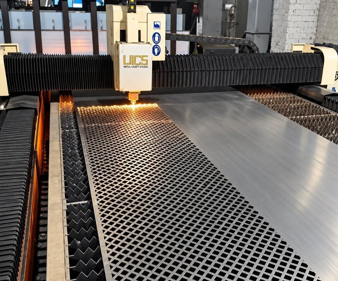 Fibre laser cutting a perforated pattern in a stainless steel sheet