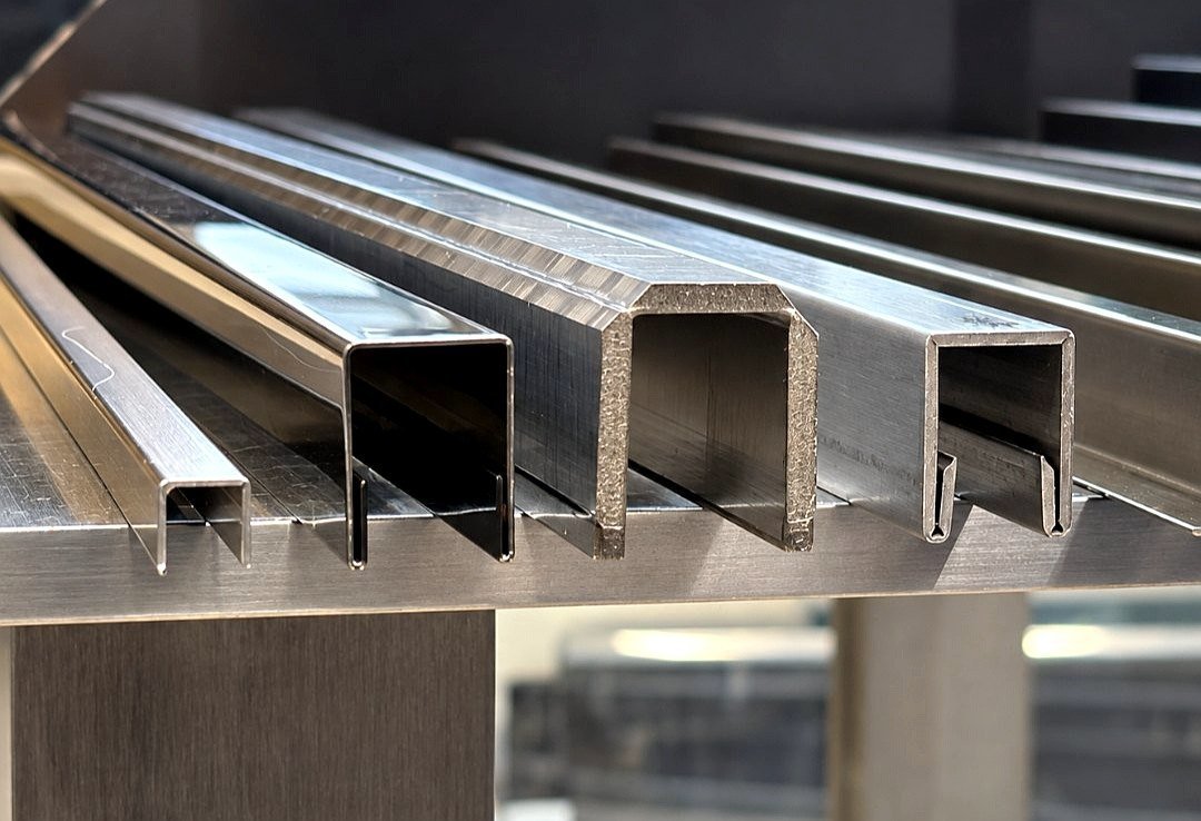 Stainless steel U and channel profiles with sharp V-grooved corners