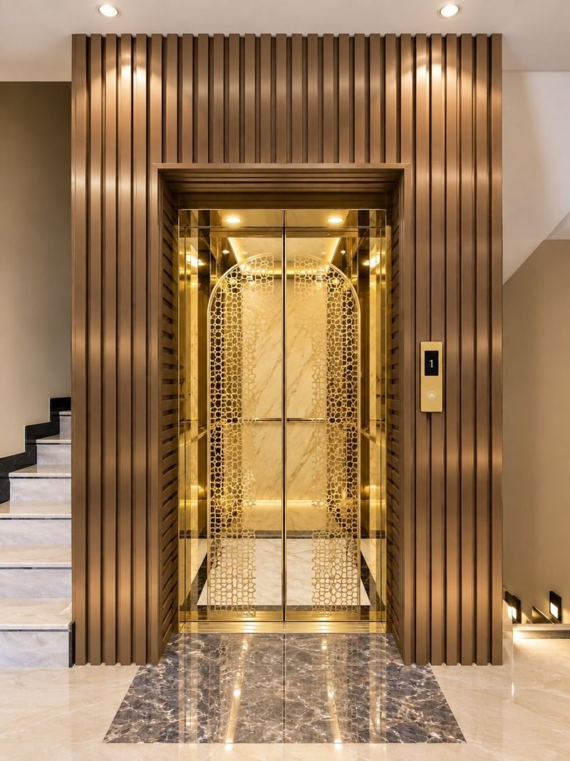 Illustration: lift cladding in brass finish with fluted panels