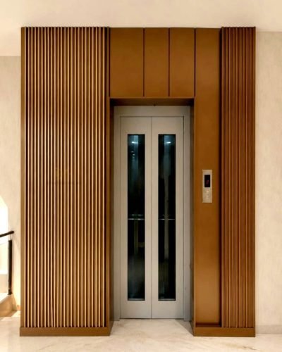 Lift cladding in bronze finish with fluted panels — Lift Cladding · Lift Solutions
