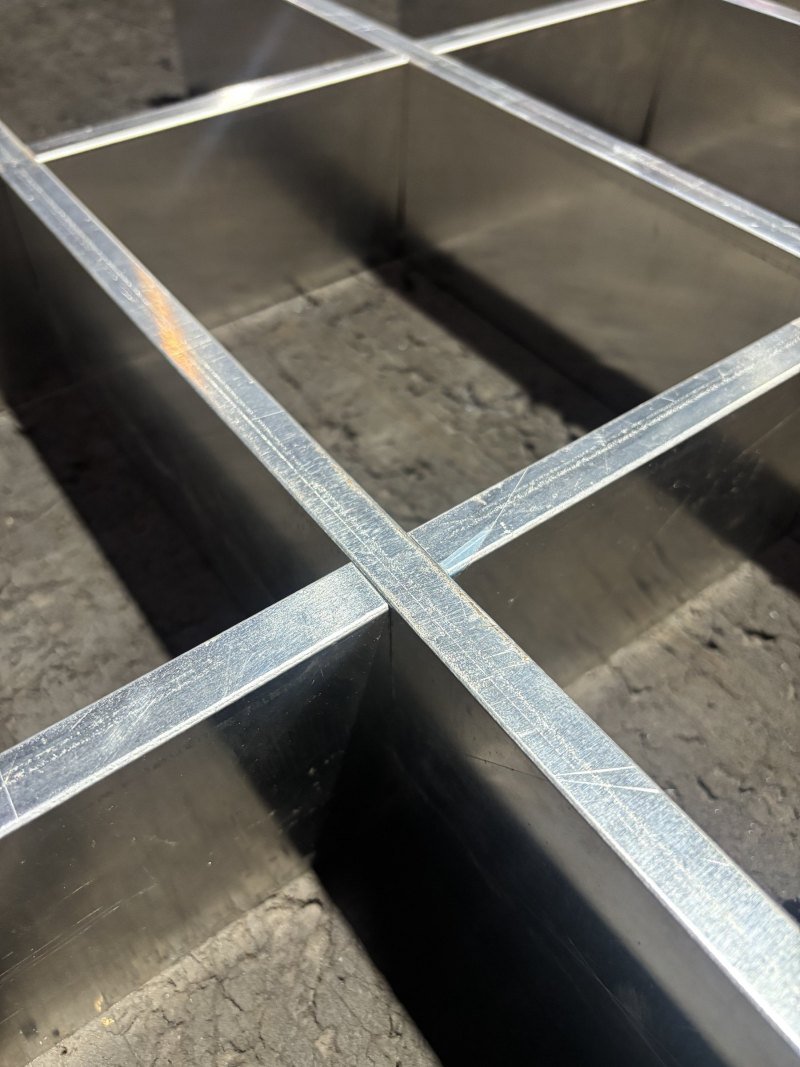 Ceiling grid components laid out for assembly