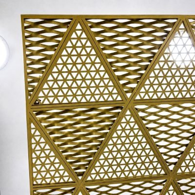 Brass-finish triangular laser-cut ceiling panel
