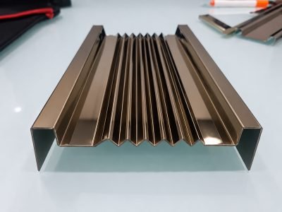 Illustration: decorative louver panel in bronze finish — Decorative Louvers · Metal Louvers