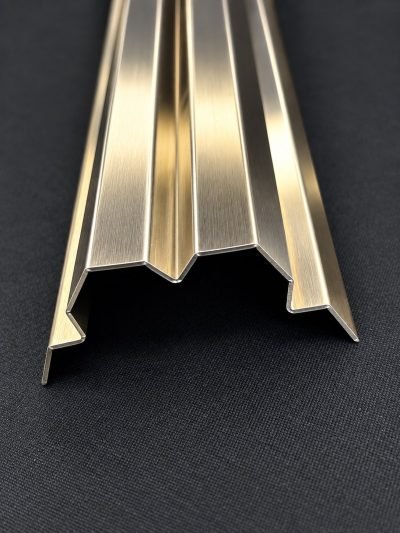 Decorative louver profile in brushed stainless steel, end view — Decorative Louvers · Metal Louvers