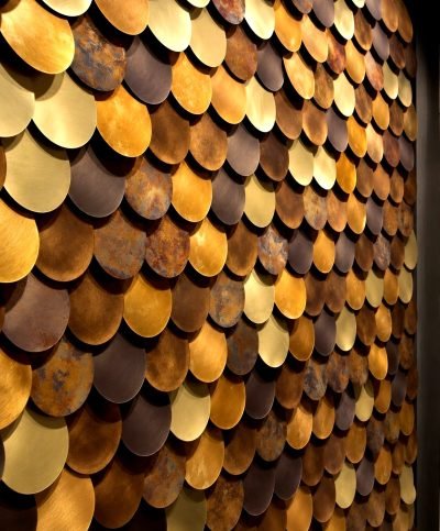 Fish scale shingles in copper and brass finishes, wall detail