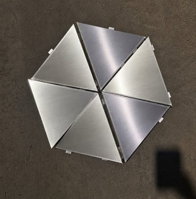 Triangular metal shingles in brushed stainless steel, module
