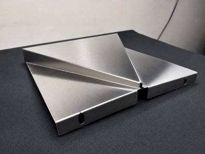 Illustration: triangular metal shingle modules in stainless steel