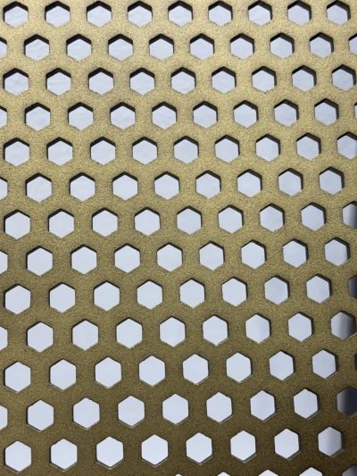 Gold-finish metal sheet with hexagonal perforations — Perforated Sheets · Perforated & Mesh