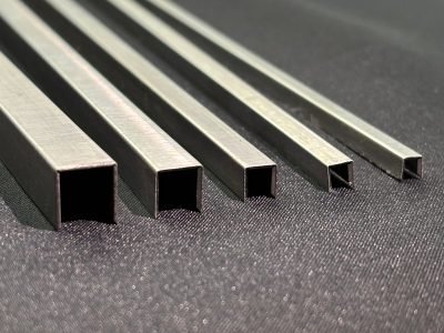 CNC V-grooving channel milled into stainless steel sheet before bending