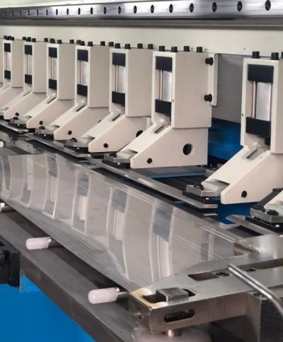 CNC V-grooving channel milled into stainless steel sheet before bending