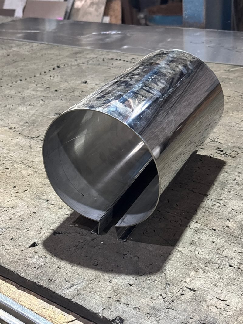 The curved section with V-grooved legs