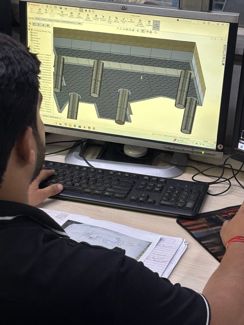 Drawing: the 3D model of a folded part on the design desk