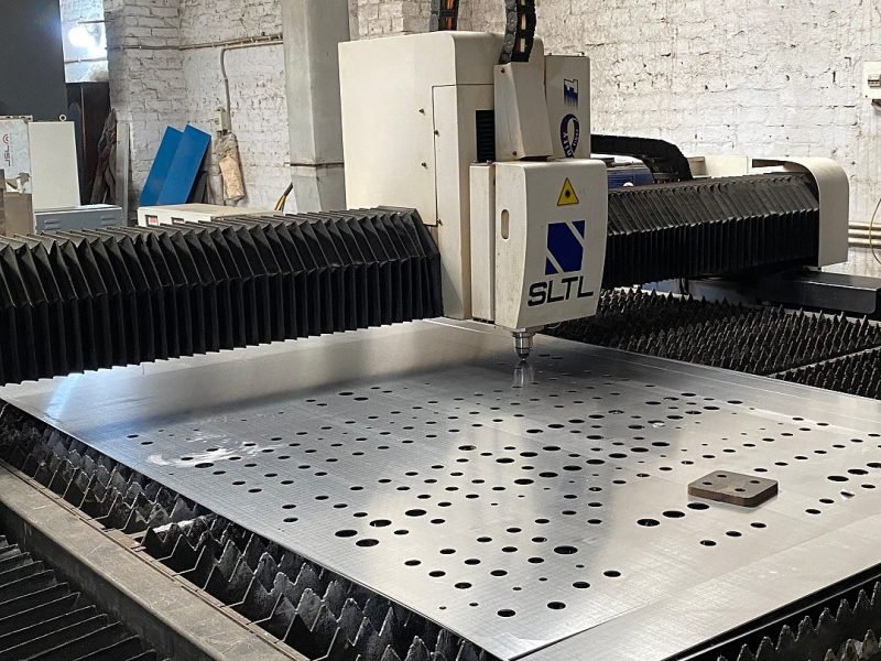 The fibre laser cutting a perforated panel on the 2 m × 4 m bed