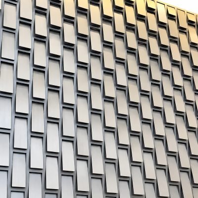 A brick-relief 3D wall panel — 3D Folded Façade Panels · Façade Systems