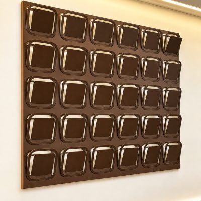 A 3D cushion-pattern wall panel in bronze — 3D Folded Façade Panels · Façade Systems